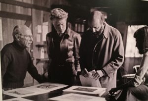 Edward Weston, Brett Weston, Ansel Adams and Dody Warren, selecting photos for Weston's "My Camera at Point Lobos," Wildcat Hill, Carmel, 1949. Photo by Cameron Macauley.